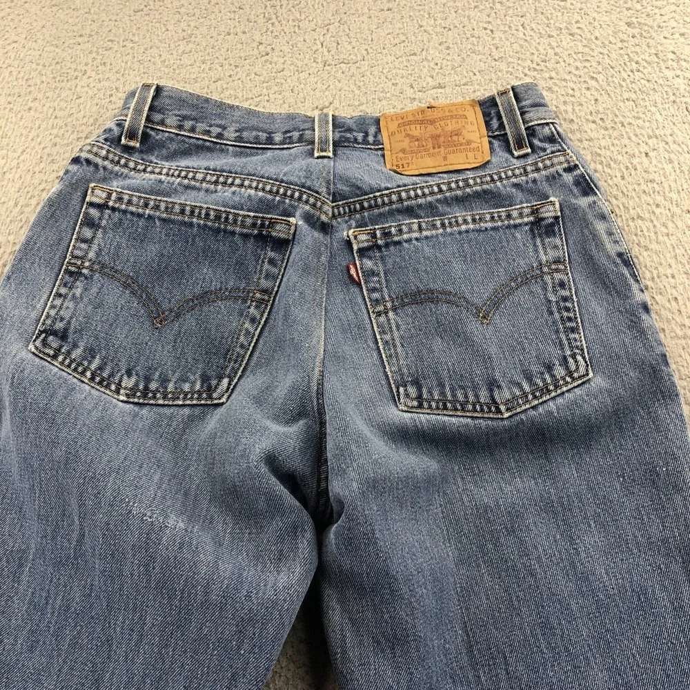 Vintage Levis Jeans Womens 28x29 Blue 517 Bootcut Raw Hem 90s Made In USA